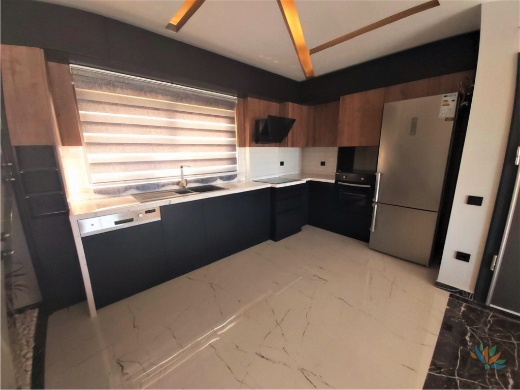 Picture shows kitchen of the Altinkum property for sale
